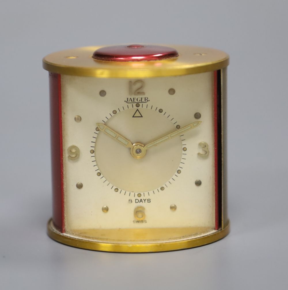 A Jaeger miniature clockwork timepiece, height 5cm, in original box